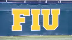 Jenkins throws for 3 TDs, runs for another and FIU beats Sam Houston 56-16 in regular-season finale